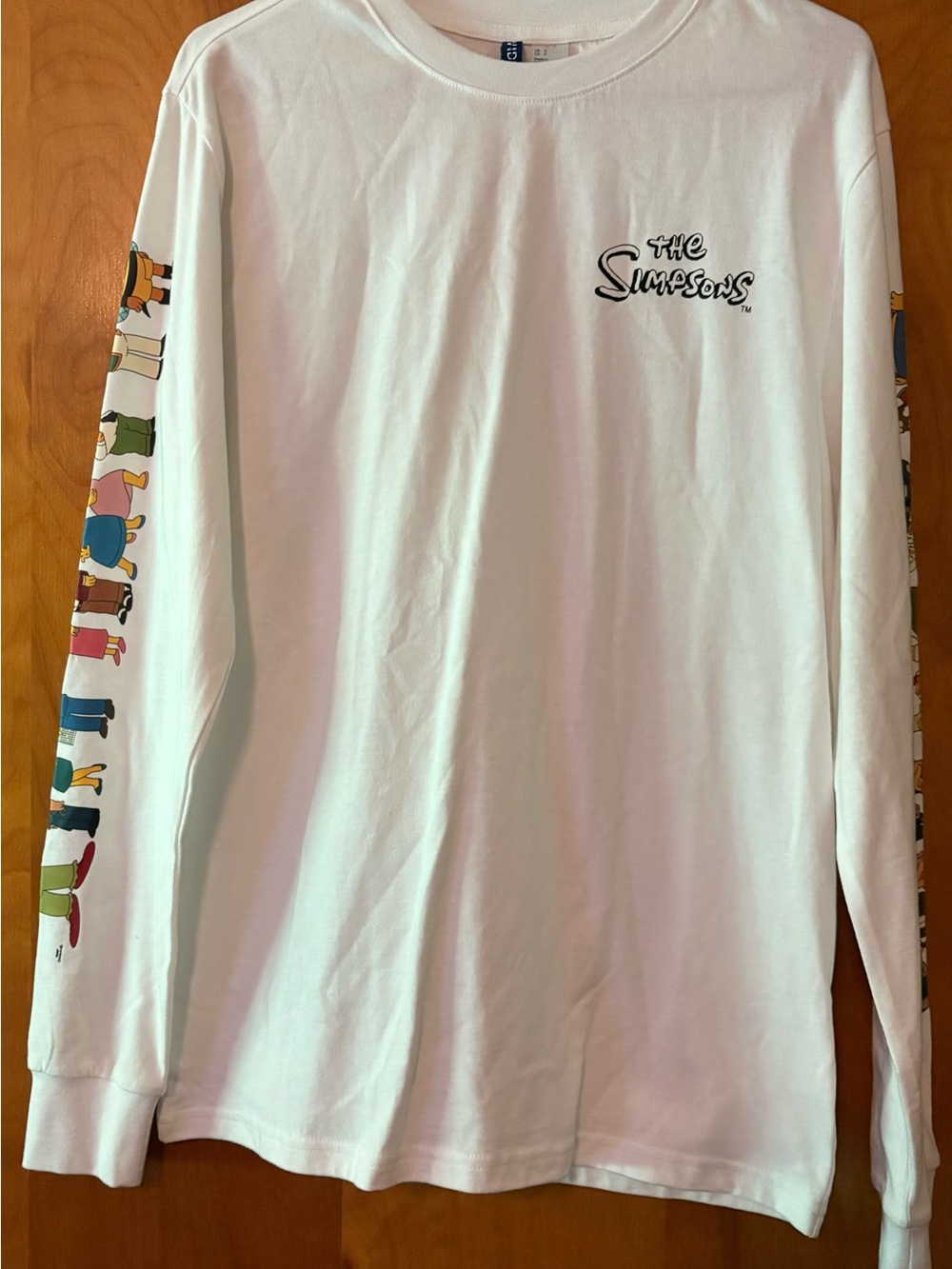 The Simpsons White Long Sleeve Tee with Character Sleeve Print Adult Small